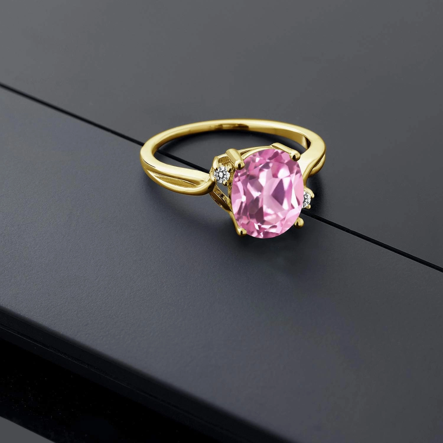 18K Yellow Gold Plated Silver Light Pink Created Sapphire and White Diamond 3 Stone Ring For Women (3.03 Cttw, Oval 10X8MM, Gemstone September Birthstone, Available In Size 5, 6, 7, 8, 9)