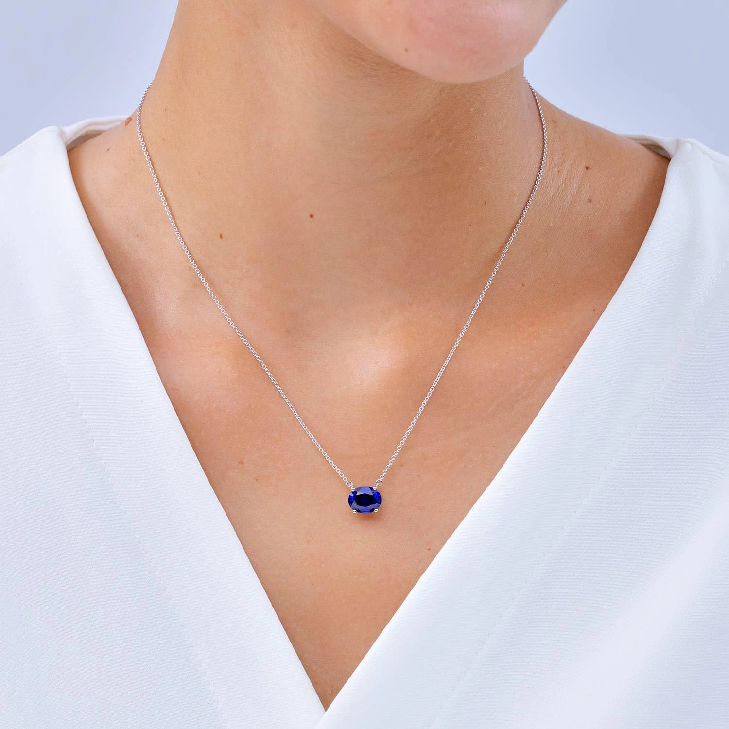 Angara Lab Grown East-West Oval Blue Sapphire Solitaire Pendant in Silver / 14K Solid Gold/Platinum | September Birthstone, Birthday, Engagement, Anniversary, Wedding Jewelry Gift for Women