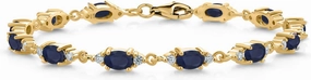 Gem Stone King 18K Yellow Gold Plated Silver Blue Sapphire and White Moissanite Tennis Bracelet For Women (7.57 Cttw, Gemstone Birthstone, Oval 6X4MM, 6.5 Inch)