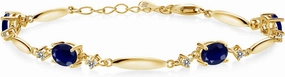 Gem Stone King 18K Yellow Gold Plated Silver Gemstone Birthstone and White Diamond Tennis Bracelet For Women | Oval 7X5MM and 2MM | 6 Inch   1 Inch Extender | Fine Jewelry for Her Mom Wife