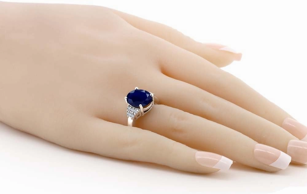 Gem Stone King 5.40 Cttw Blue Sapphire and White Topaz Engagement Ring For Women | 925 Sterling Silver | Oval 12X10MM | Gemstone Birthstone | Available In Size 5, 6, 7, 8, 9