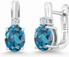 Gem Stone King 925 Sterling Silver London Blue Topaz and White Created Sapphire Earrings For Women (3.70 Cttw, Gemstone November Birthstone, Oval 9X7MM)