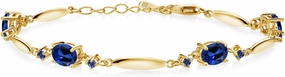 Gem Stone King Gemstone Birthstone Tennis Bracelet For Women | 18K Yellow Gold Plated Silver | Oval 7X5MM and Round 2MM | 6 Inch   1 Inch Extender | Fine Jewelry for Her Mom Wife