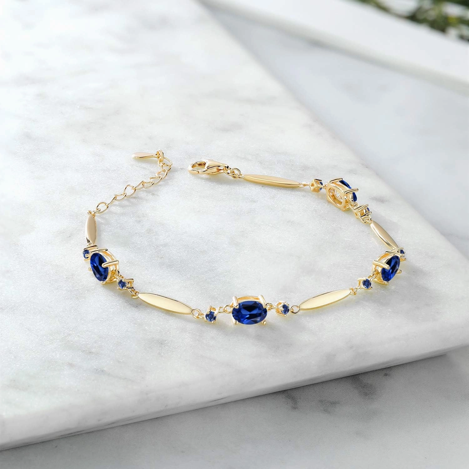 Gem Stone King Gemstone Birthstone Tennis Bracelet For Women | 18K Yellow Gold Plated Silver | Oval 7X5MM and Round 2MM | 6 Inch   1 Inch Extender | Fine Jewelry for Her Mom Wife